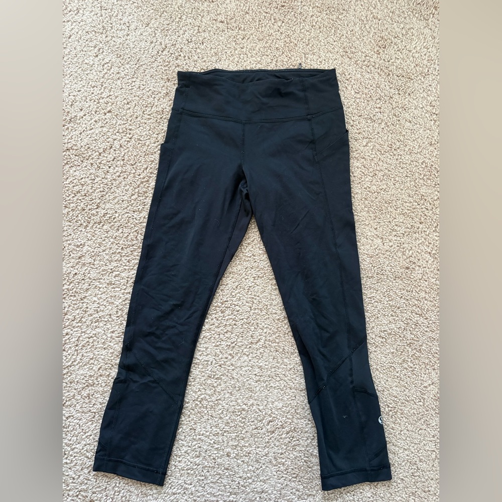 lululemon Black Cropped Leggings Mesh Panels Pockets Size 4